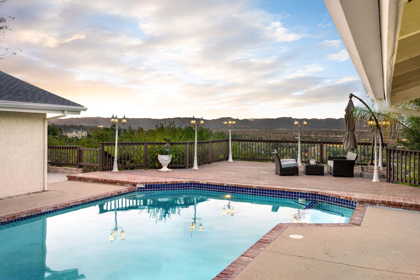 Coated pool deck and patio overlooking the valley