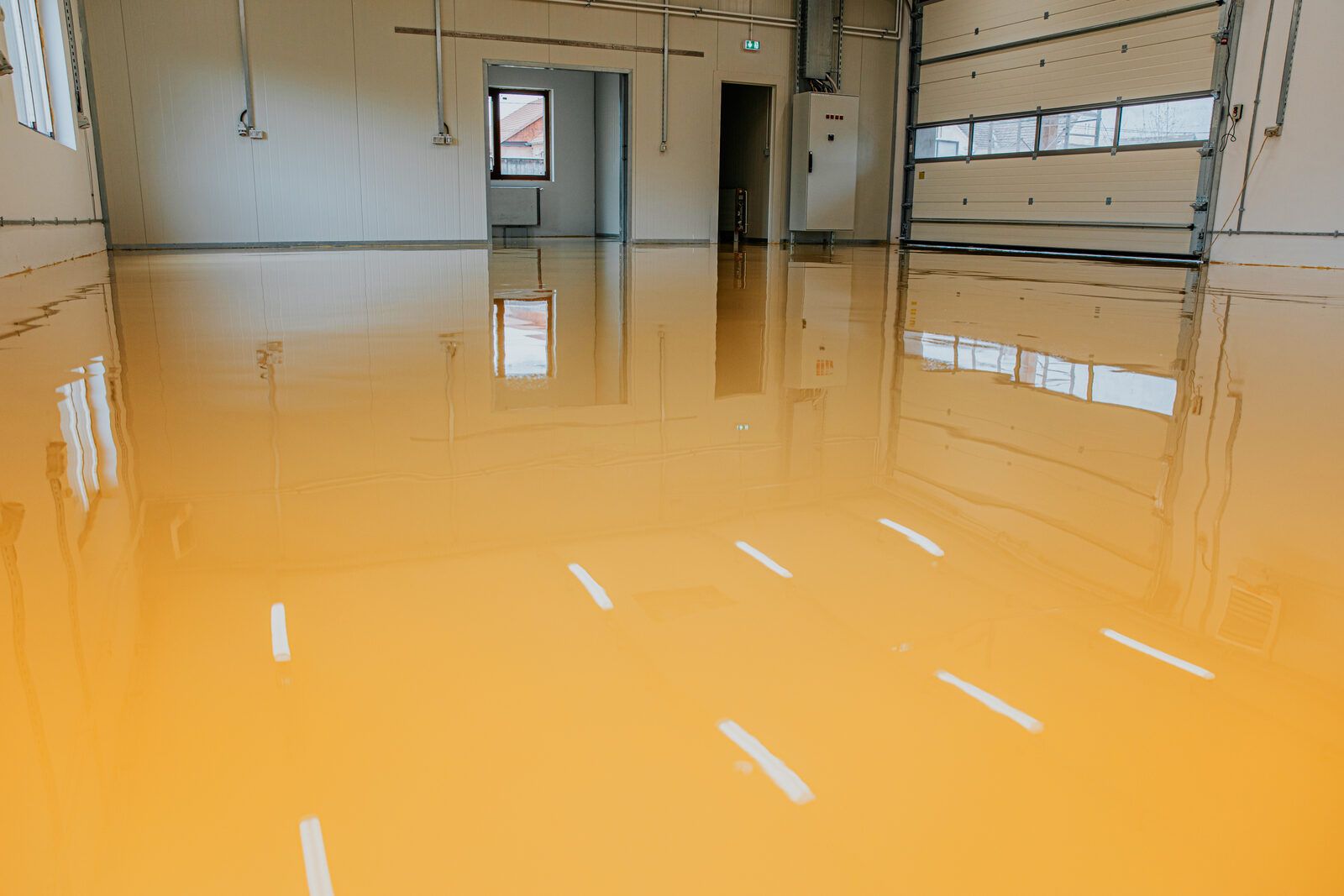 High-gloss amber epoxy in an empty industrial unit